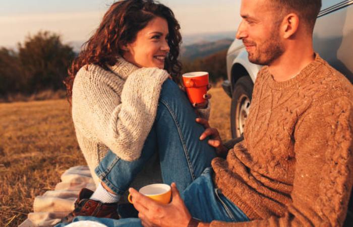 Couples enjoying romantic dates like picnics or beach outings