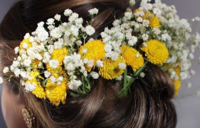 Twisted Bun With Marigold Blooms